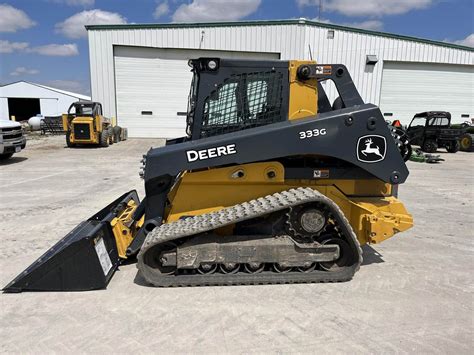 333 john deere skid steer|john deere 333g track size.